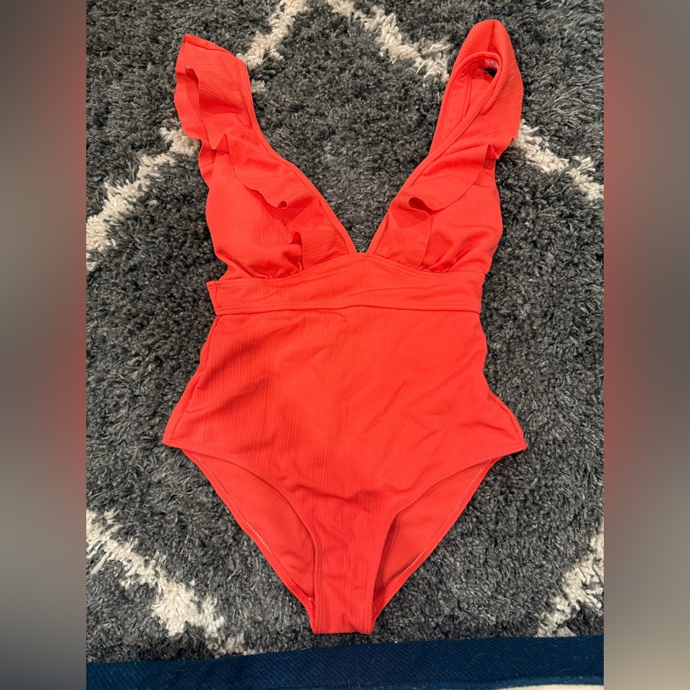 One piece size medium NWOT- has padding